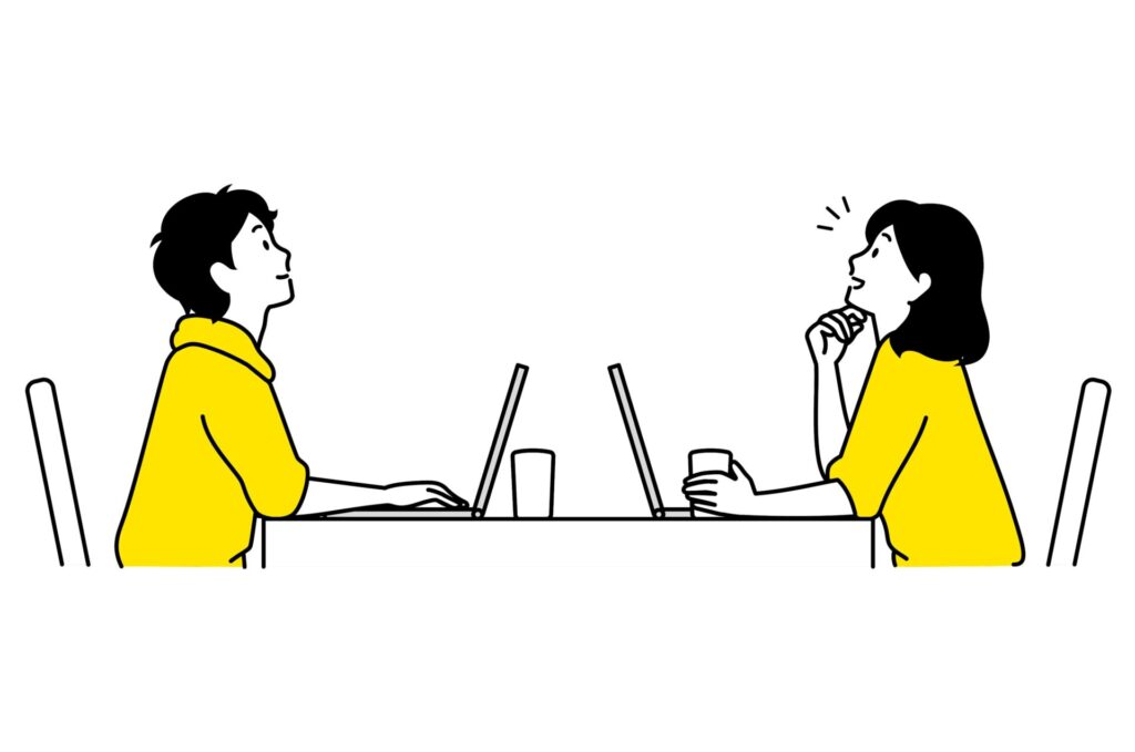 向かい合ってパソコンを開いている男性と女性のイラスト画像