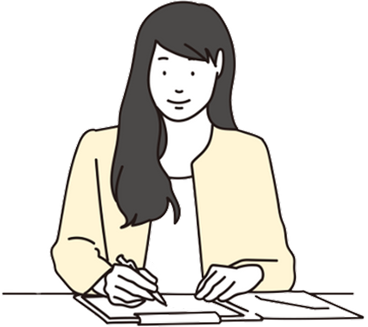 文字を書いている女性